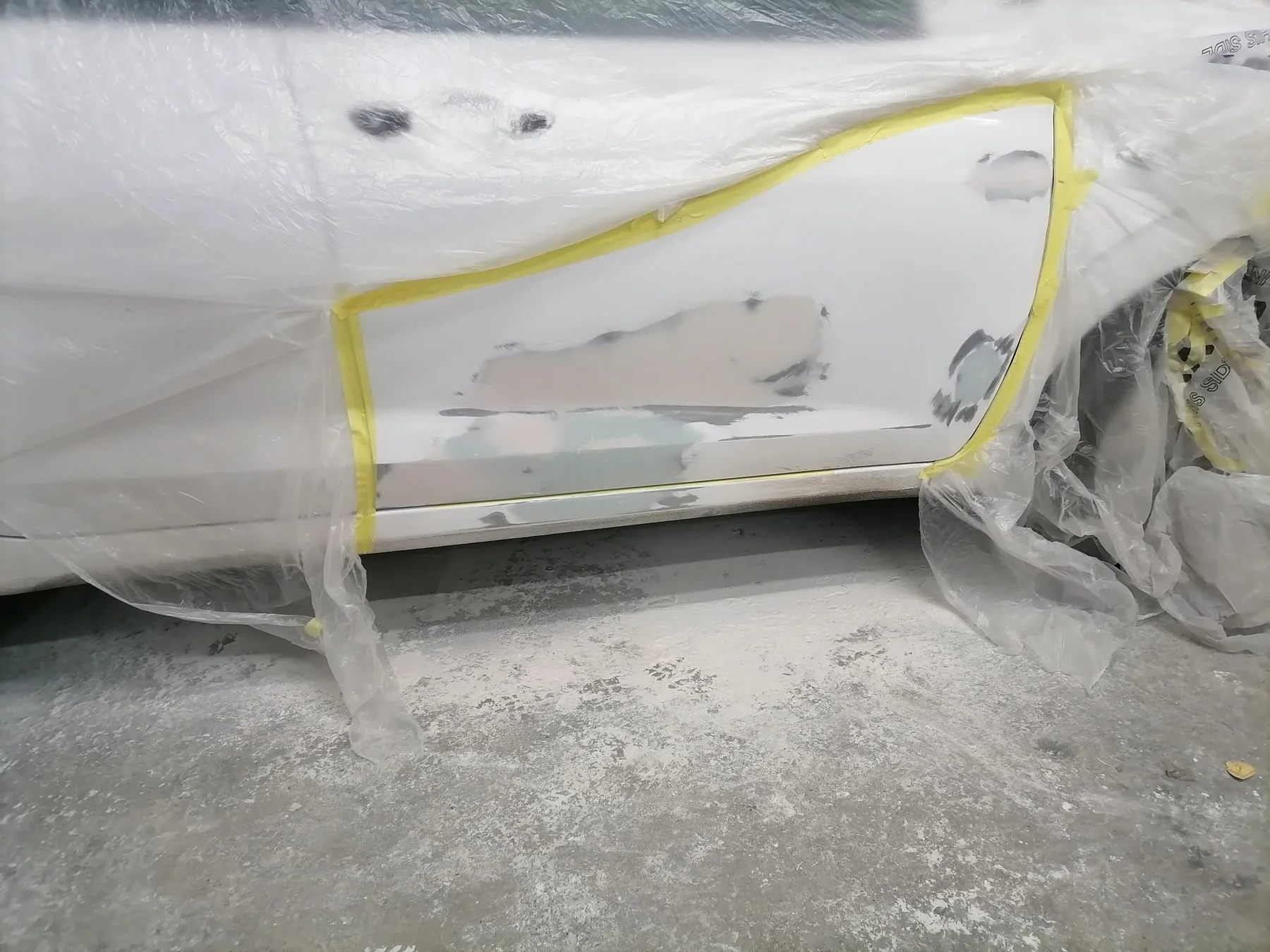 Vehicle panel before repair work
